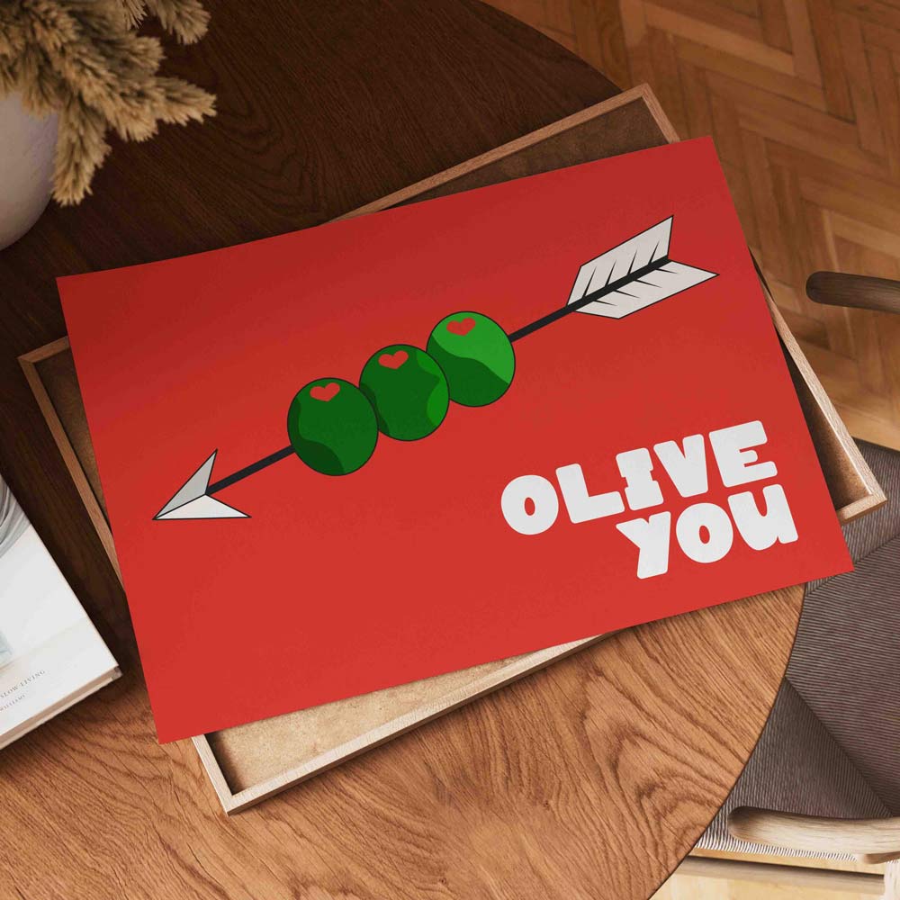 Affiche Olive You avec illustration graphique d’olives et message humoristique
