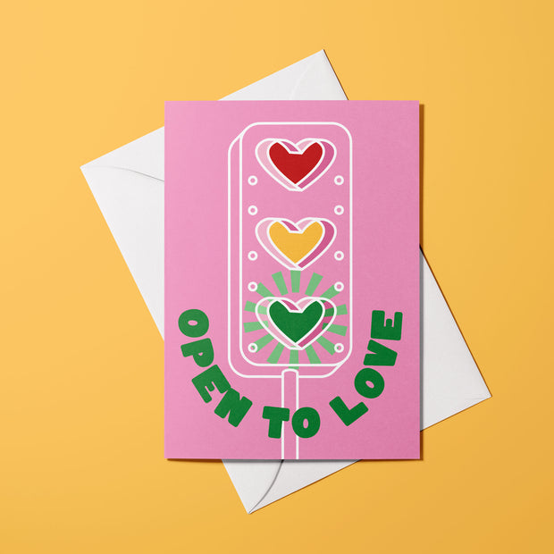 Affiche Open to Love avec illustration graphique de feu tricolore en forme de cœur
