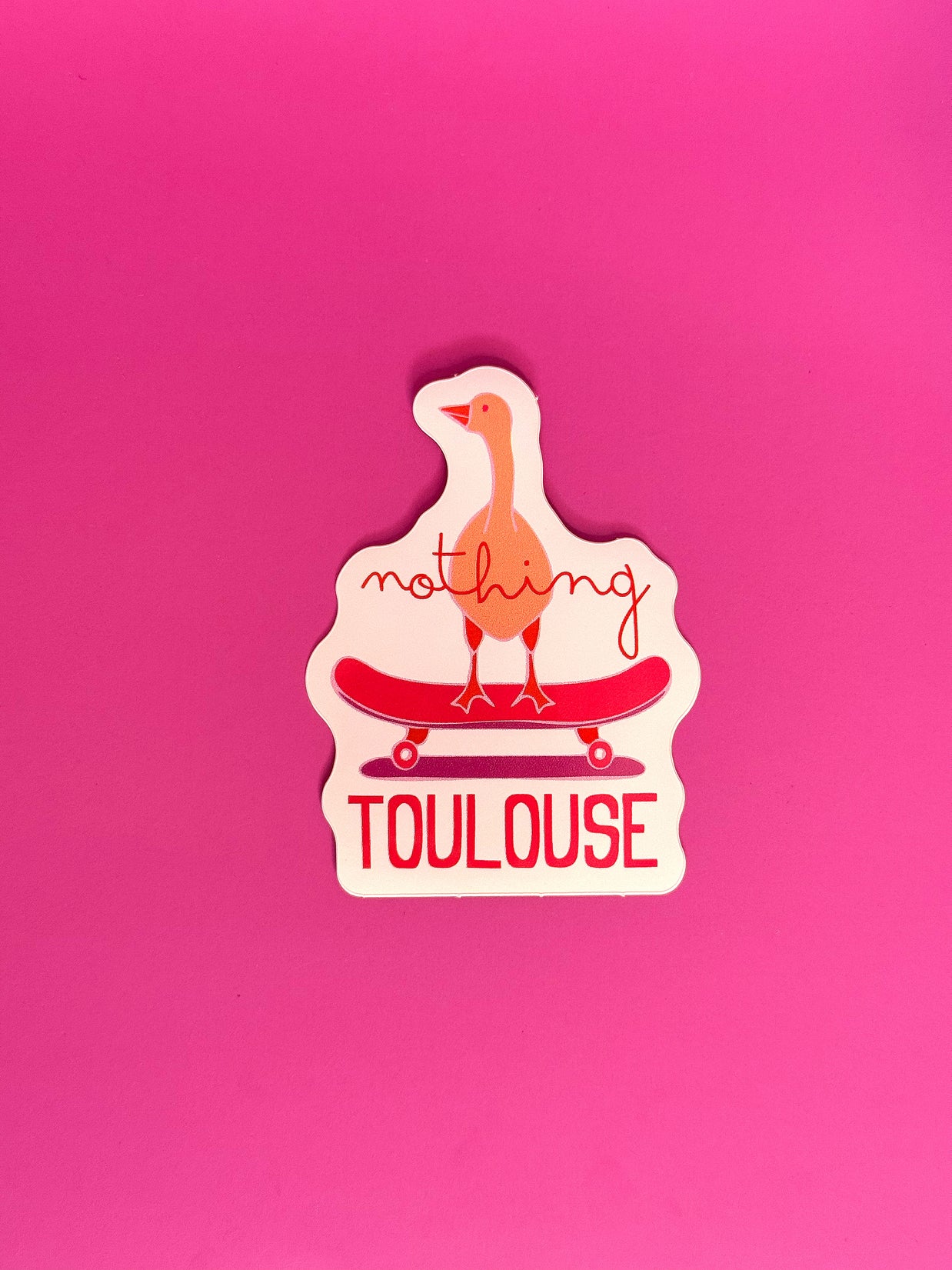 Sticker Nothing Toulouse con un pato ilustrado sobre un skate
